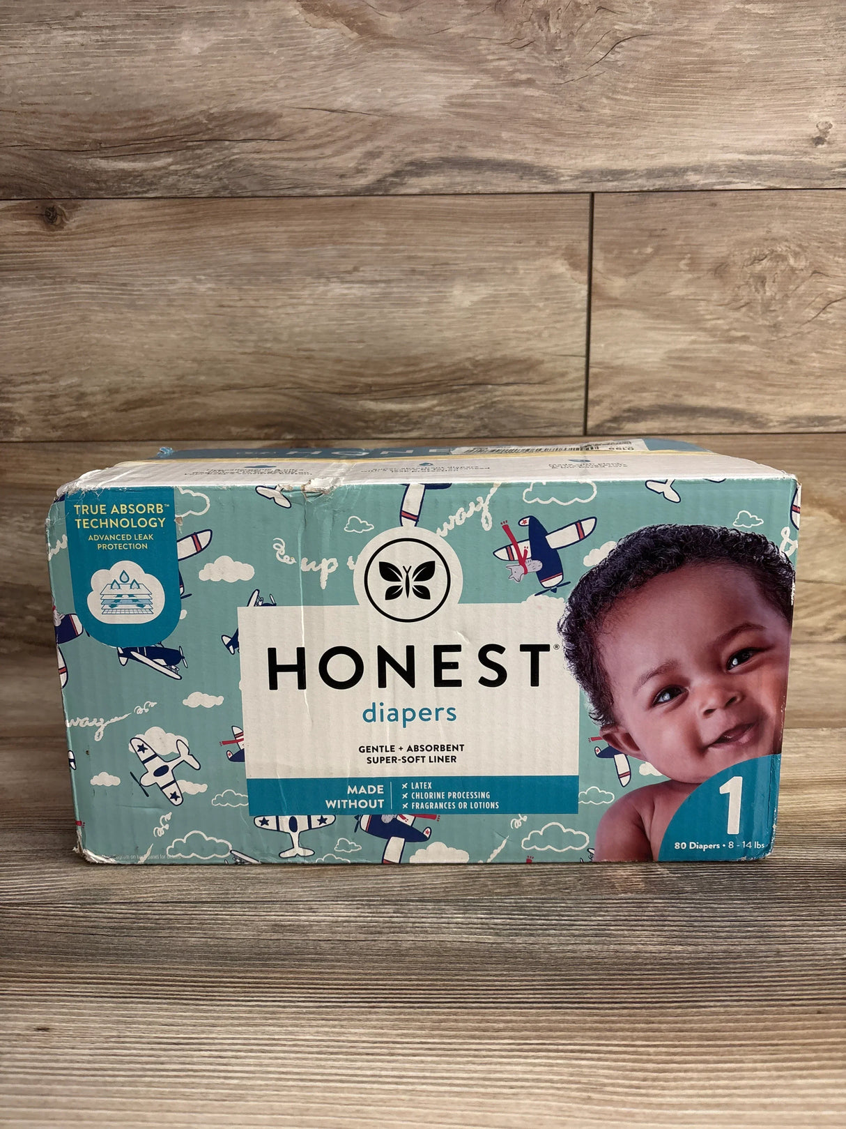 Box of Honest diapers size 1 for babies 8-14 lbs, featuring gentle design with absorbent liner
