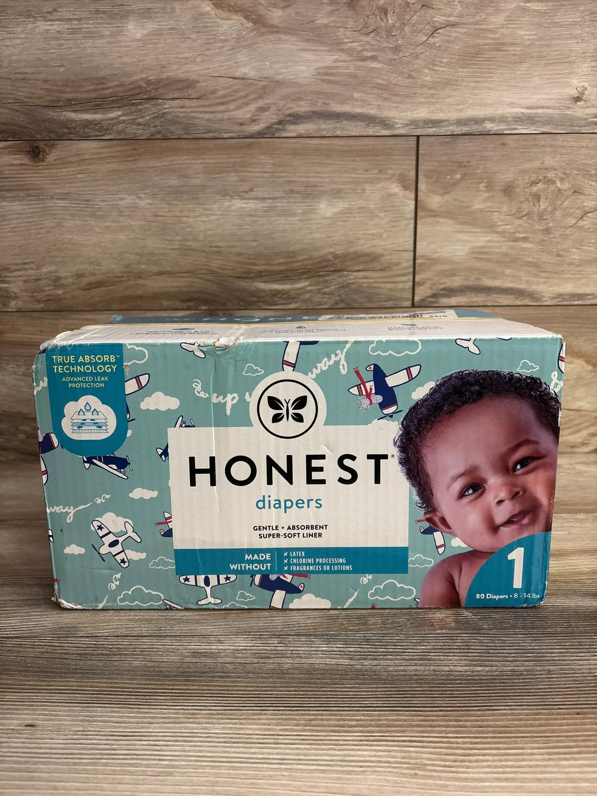 Box of Honest diapers size 1 for babies 8-14 lbs, featuring gentle design with absorbent liner