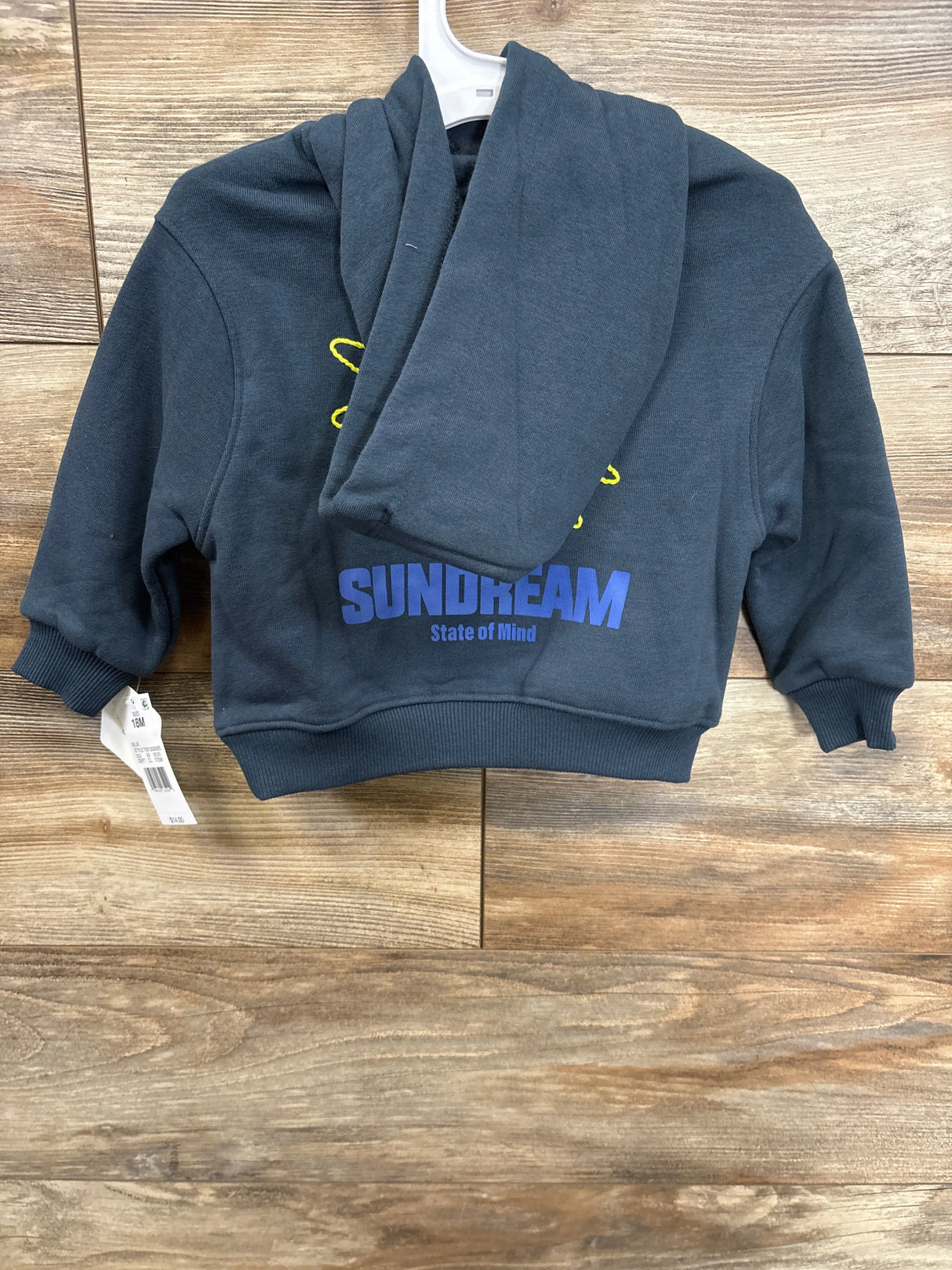 Kids dark blue hooded sweatshirt with 'SUNDREAM State of Mind' text, size 18M, on hanger