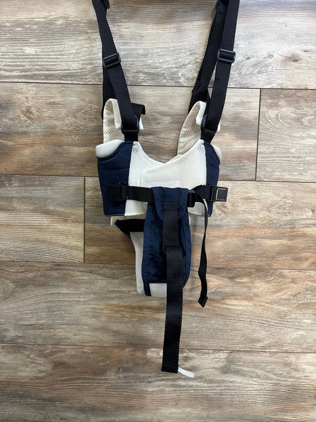 Top view of Pricexes Handheld Baby Walking Harness with navy and white mesh panels, adjustable straps, and buckles