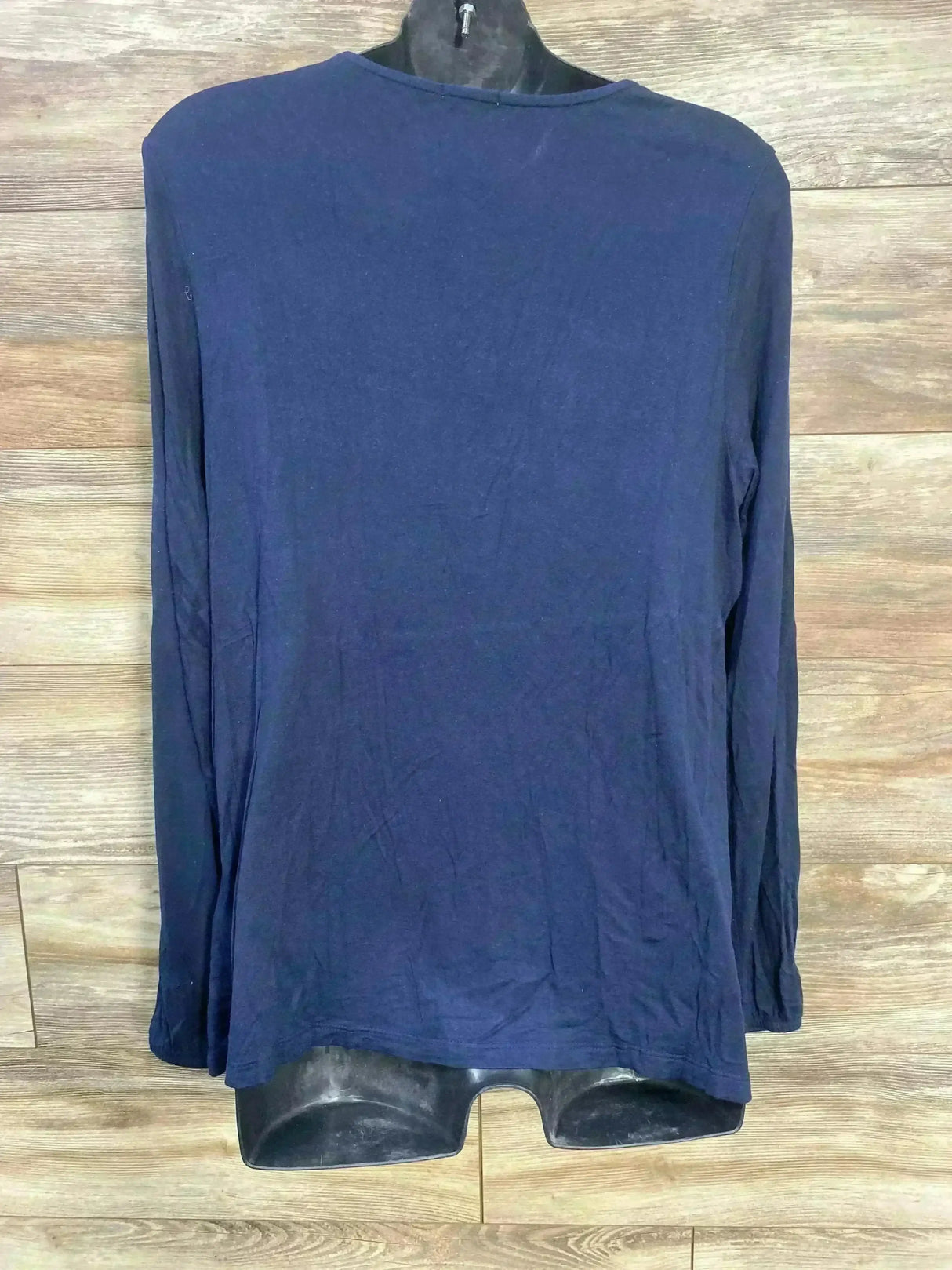 Back view of Vertbaudet navy long-sleeve nursing shirt (size Large) on black dress form against wood-plank background