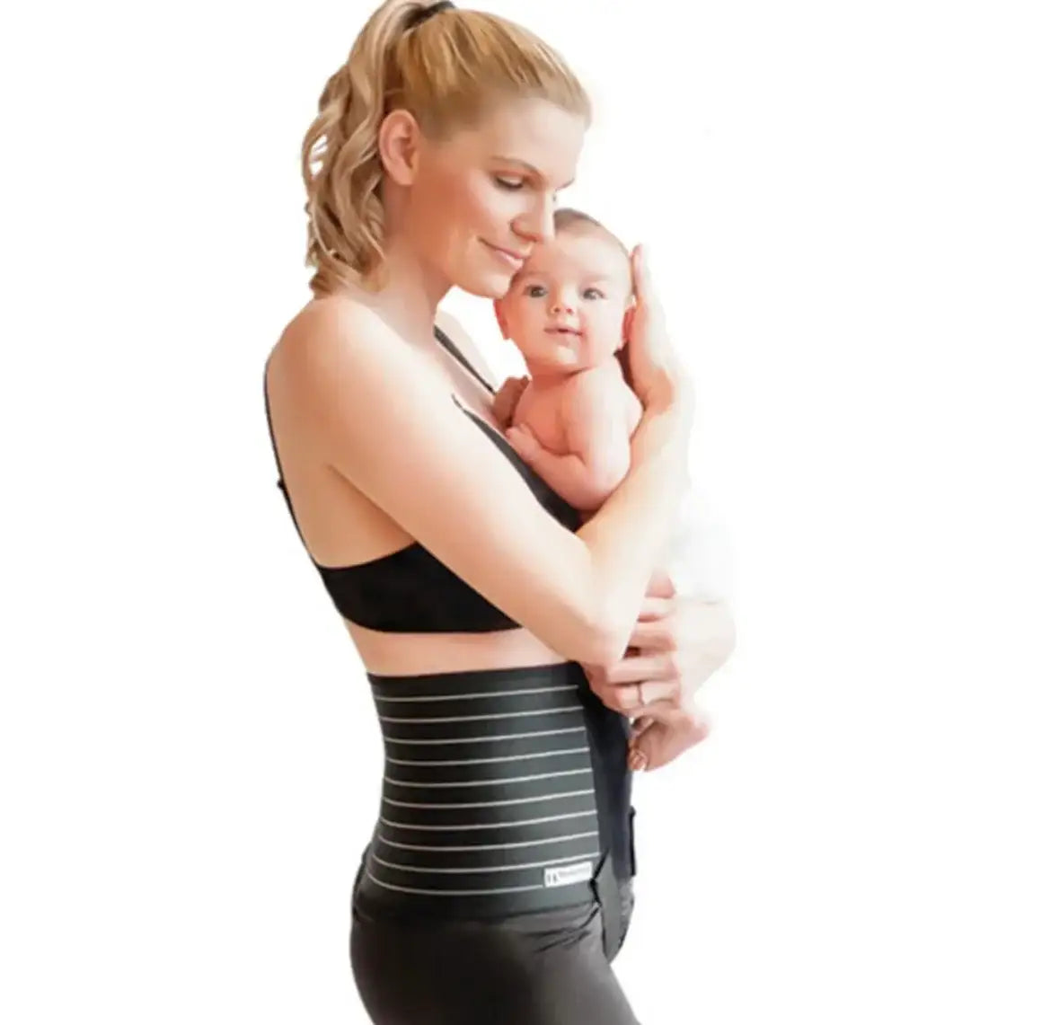 Mother holding baby, wearing black postpartum belly wrap, white background
