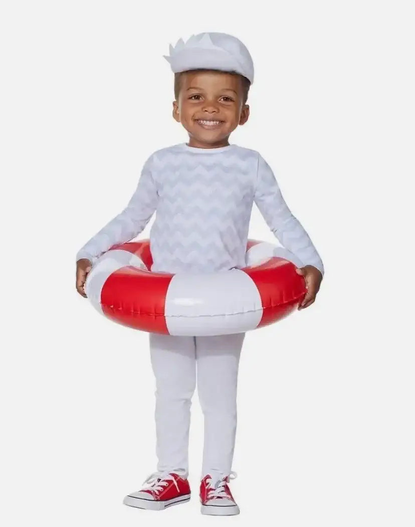 Front view of Pinkfong Blue Baby Shark costume on a child, with a shark-fin cap and red-and-white inflatable ring