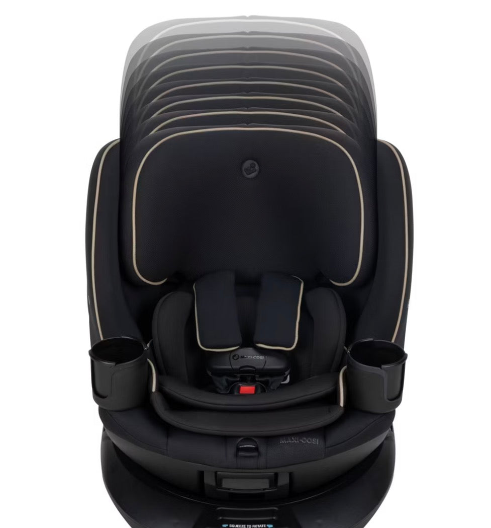 Front view of Maxi-Cosi Andi convertible car seat in Caspian Caviar with dual cup holders and harness on white background