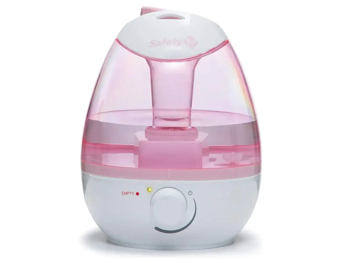 Front view of Safety 1st pink and white filter-free cool mist humidifier with transparent tank and control knob
