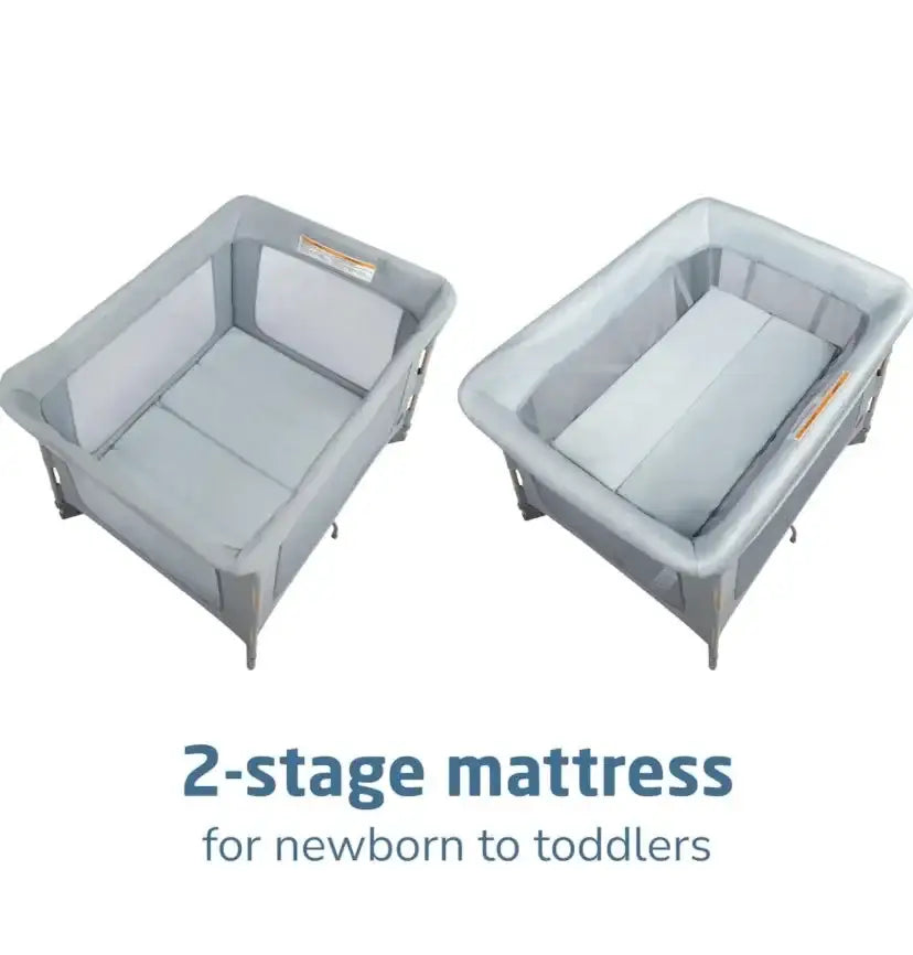 Top view of Maxi-Cosi Swift Playard in Classic Slate showcasing 2-stage mattress for newborn to toddlers on white background