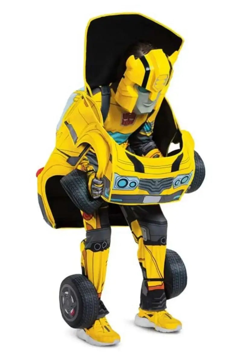 Child in yellow Bumblebee Transformer costume with car details and wheels