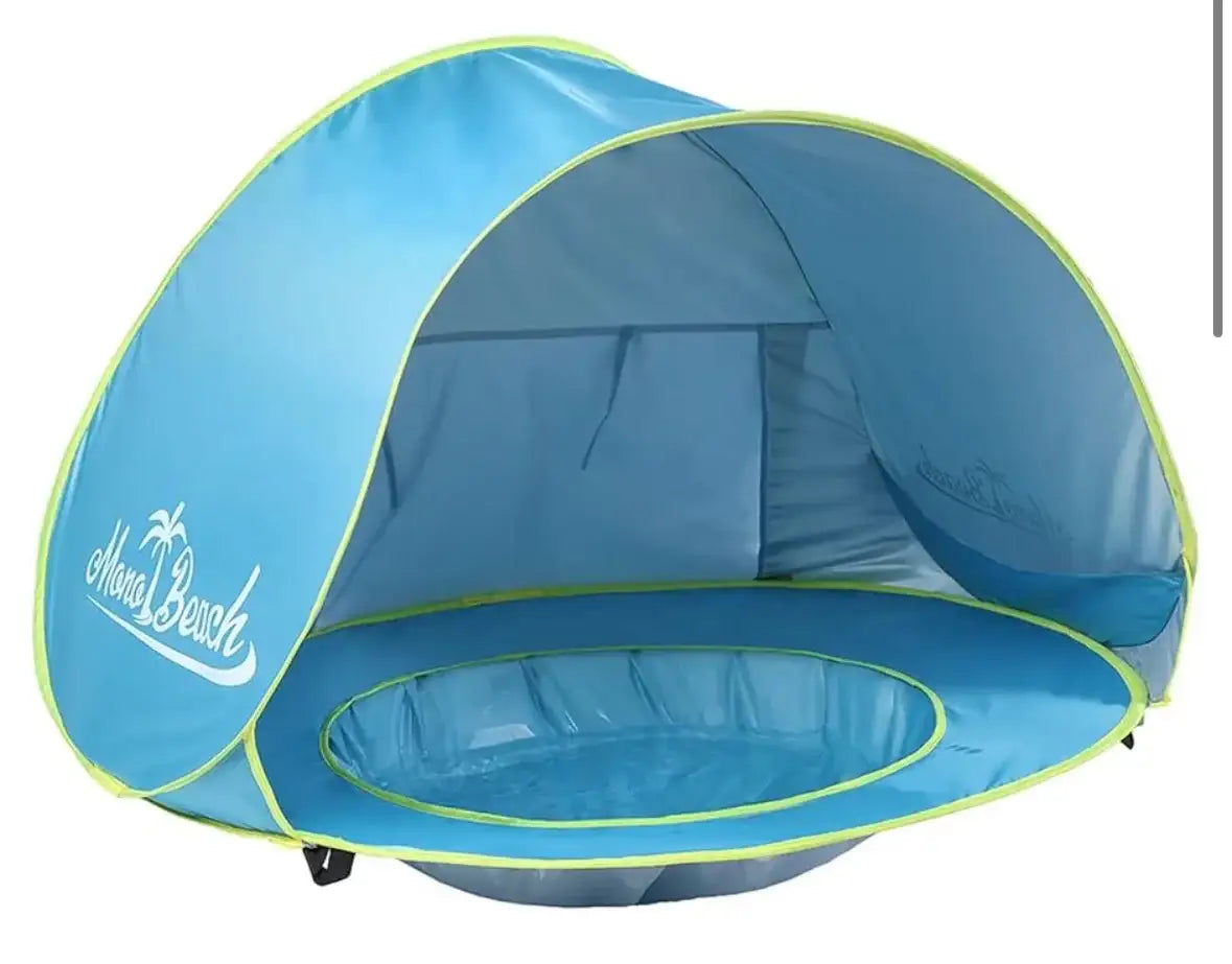 Front three-quarter view of Monobeach pop-up baby sun tent with curved canopy and shallow splash pool on white background