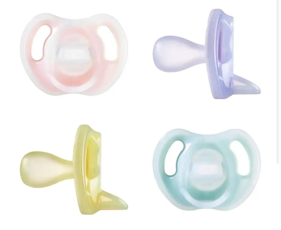 Top and side views of Tommee Tippee ultra-light soothers 4-pack showcasing pastel colors on white background