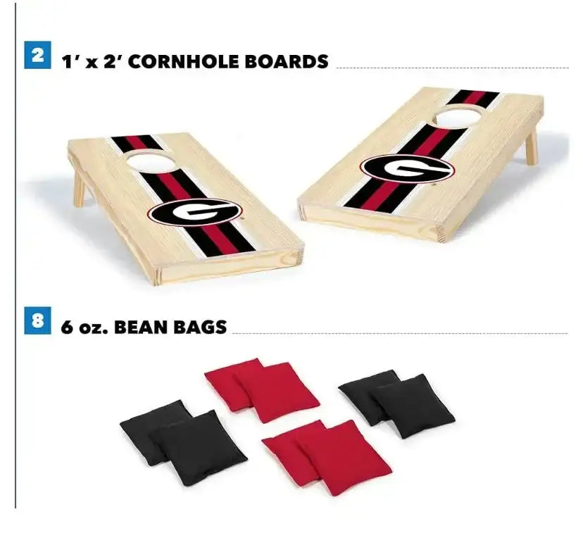 Angled view of 1'x2' wood cornhole boards with Georgia Bulldogs logo and black-red stripe and eight red/black bean bags