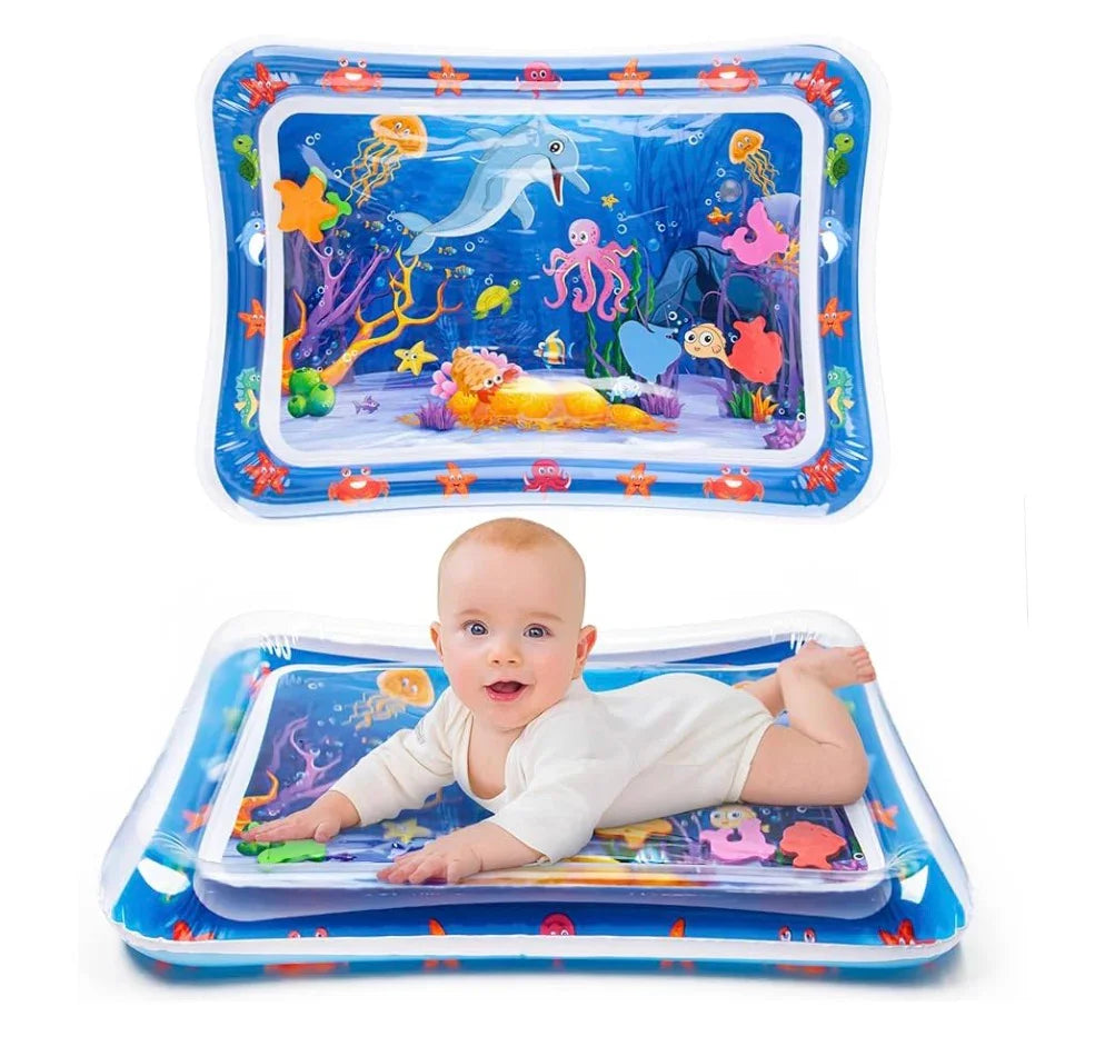 Baby on inflatable tummy time water play mat with colorful ocean animal design