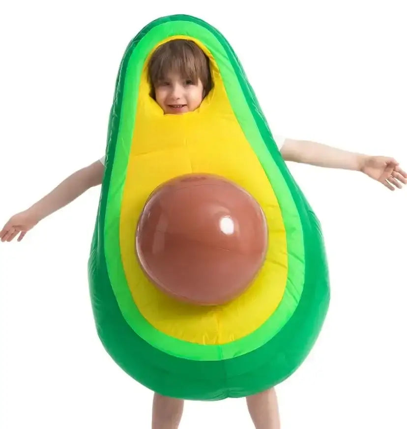 Front view of a green avocado inflatable costume on a child, showcasing yellow flesh and brown pit against a white background