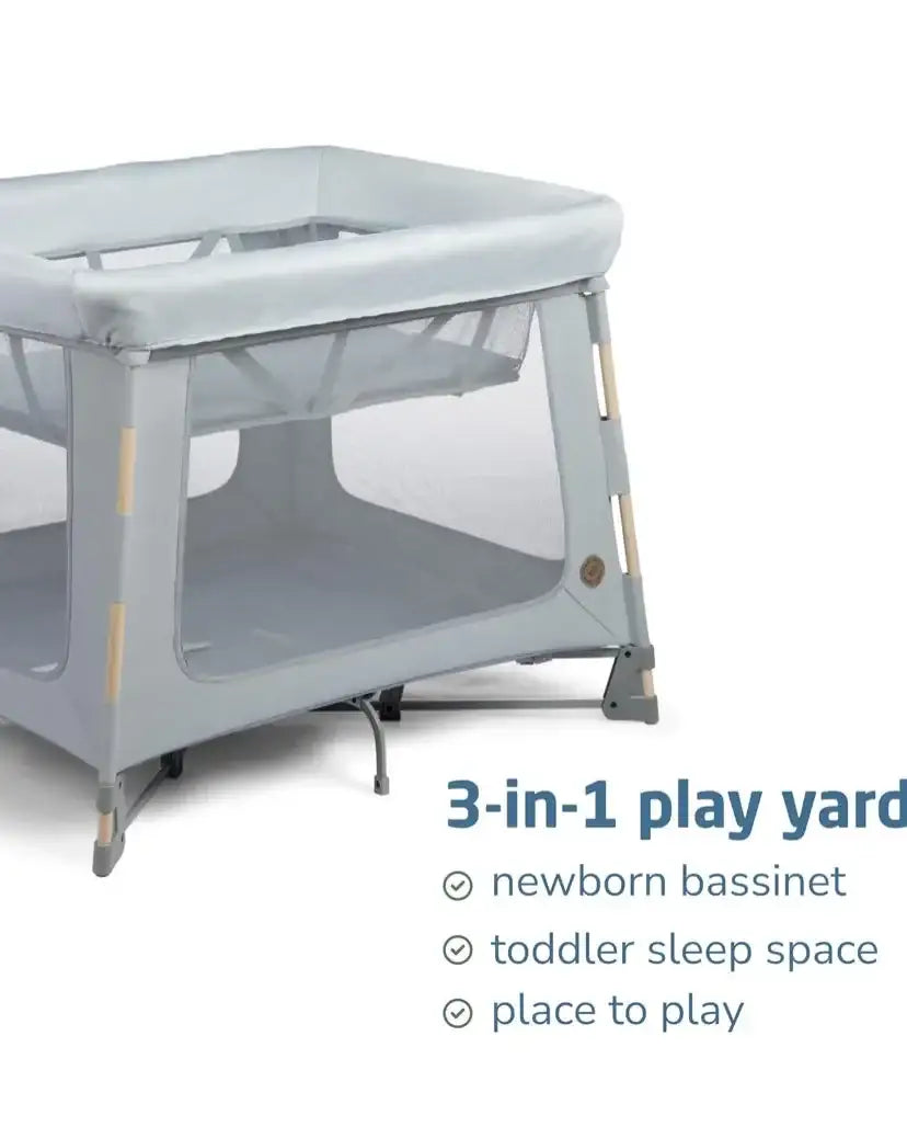 Three-quarter view of Maxi-Cosi Swift playard in Classic Slate showing mesh sides and 3-in-1 design on white background