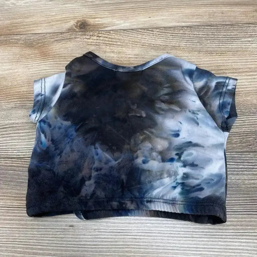Back view of baby cropped top 9–12 months, black and blue tie-dye, short sleeves, elastic hem on wood background