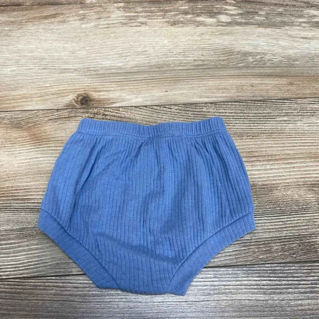 Top-down view of blue Cat & Jack baby bloomers size 0-3m showing ribbed knit texture and elastic waistband on wood background