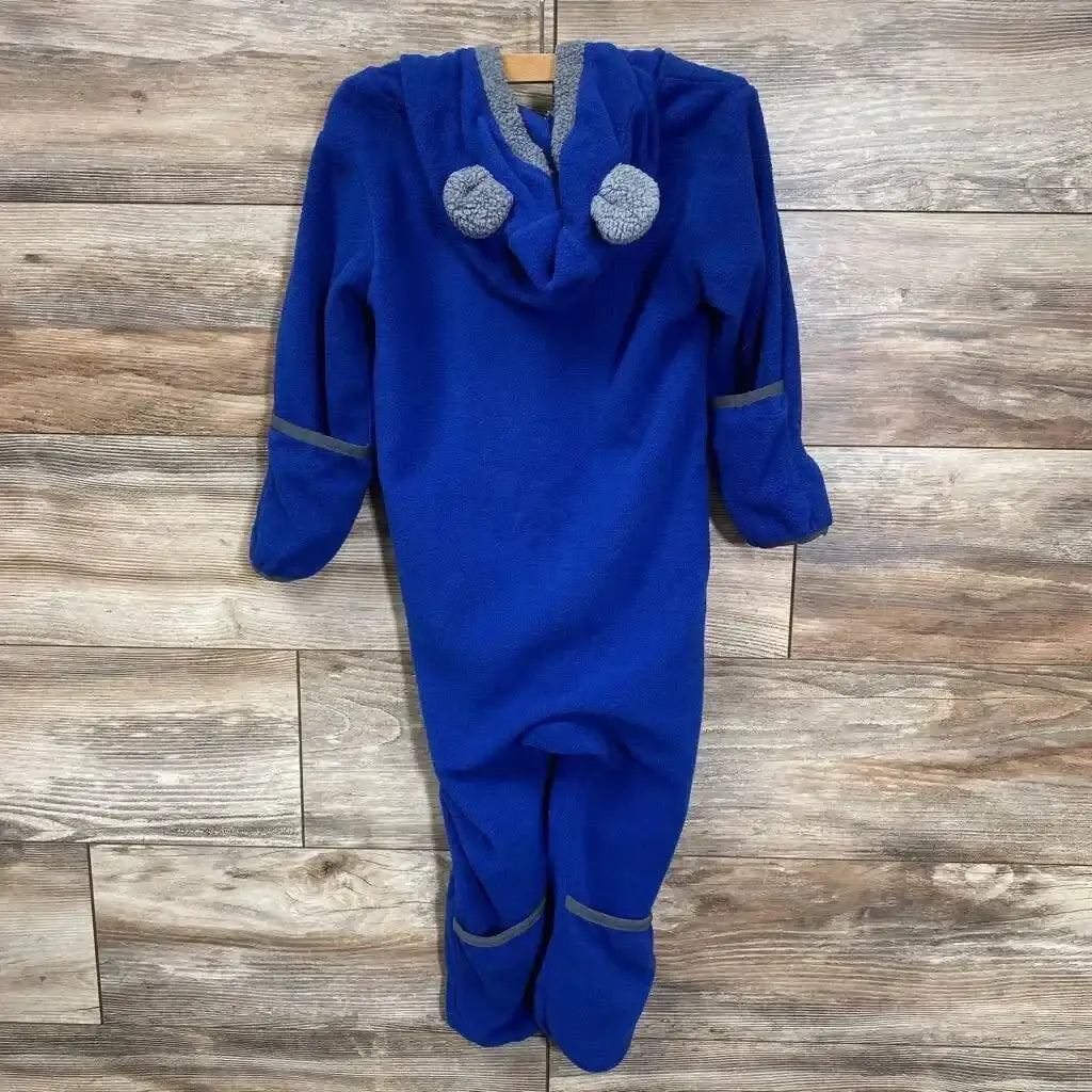 Back view of Cuddle Club bear bunting, bright blue fleece with hood and plush ears, footed legs and gray trim on wood backdrop