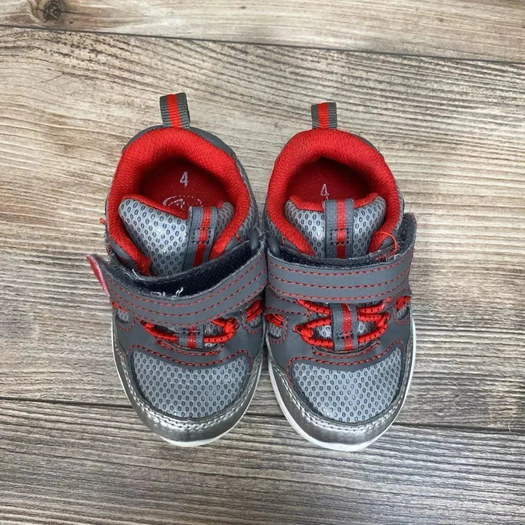 Side view of used grey Athletic Works toddler sneaker size 4C showcasing lace-up front and scuffed sole on white background