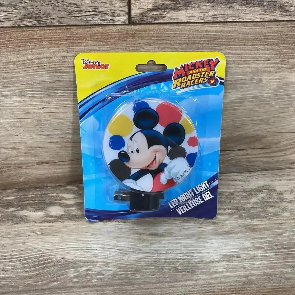 Front view of black Disney Mickey Mouse LED night light showing on/off switch on white background