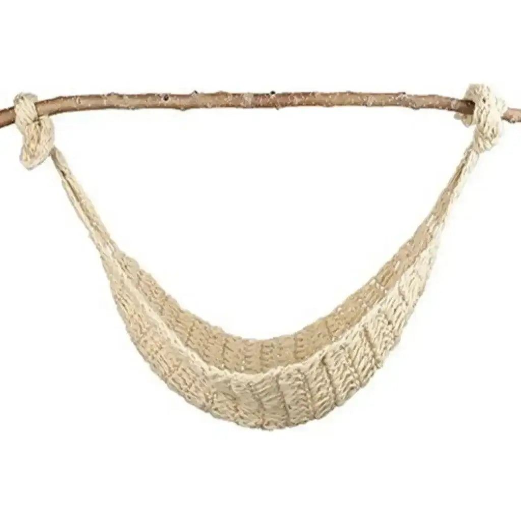Front view of beige knitted newborn photography hammock showcasing handmade ribbed knit texture and rope loops hung from a natural wood branch on white background
