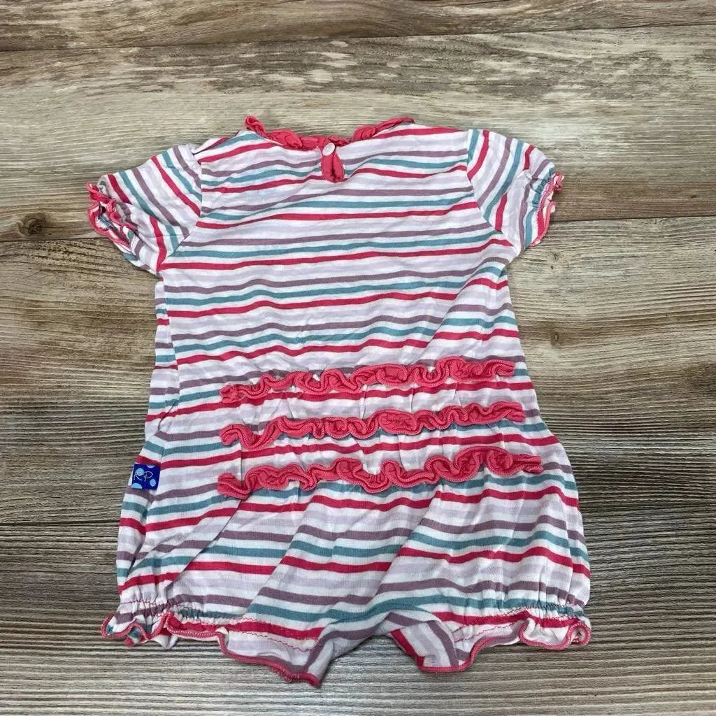 Back view of striped shortie romper (3-6 months) with three pink ruffle tiers and elastic leg openings on wood background