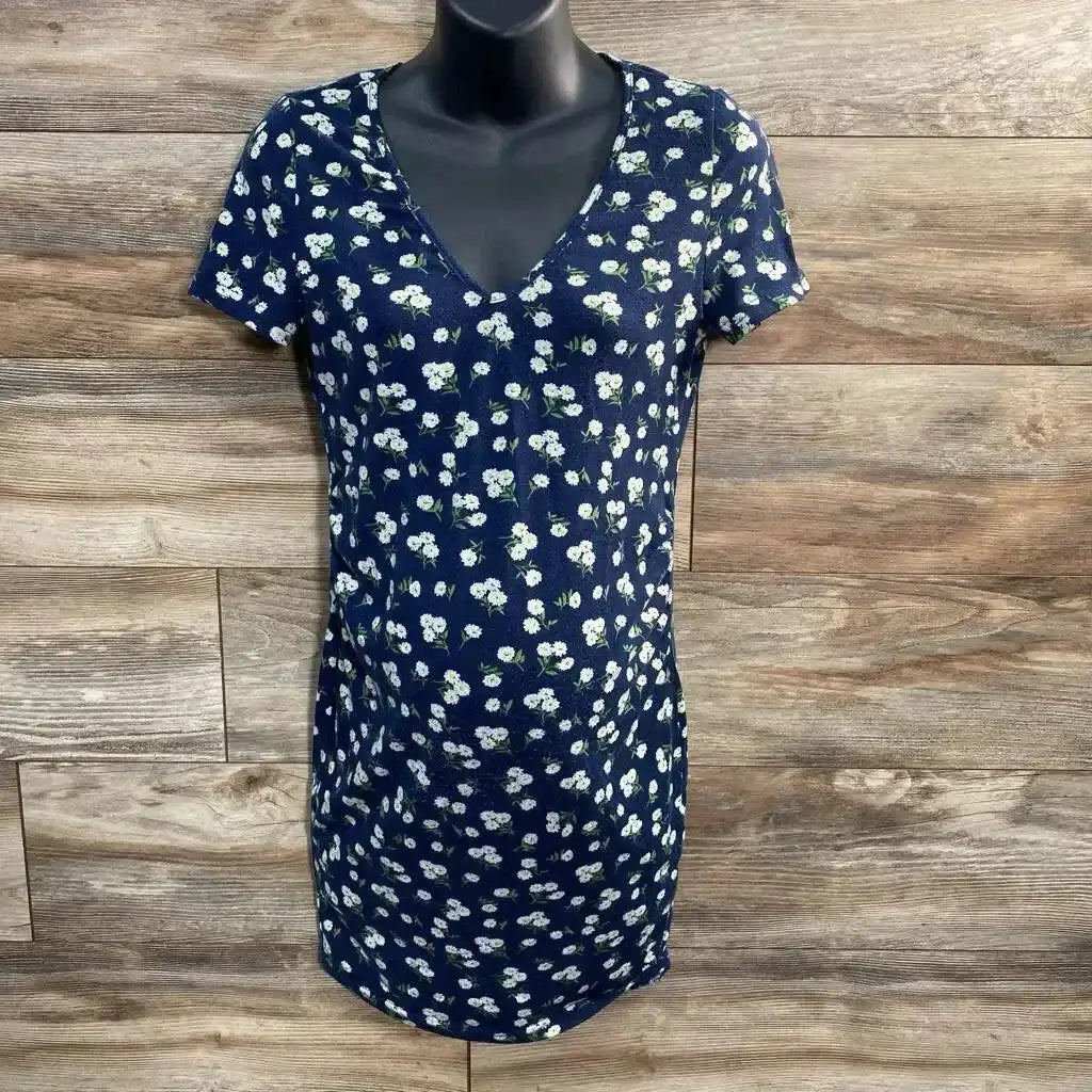 Front view of navy floral maternity bodycon dress, size S, V-neck and short sleeves on mannequin with wood background