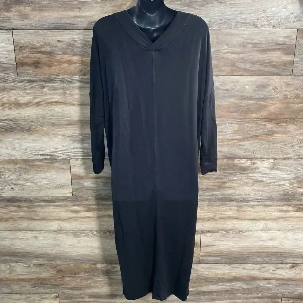 Front view of Quince black V-neck long-sleeve maxi dress size XS straight fit on mannequin with wood background
