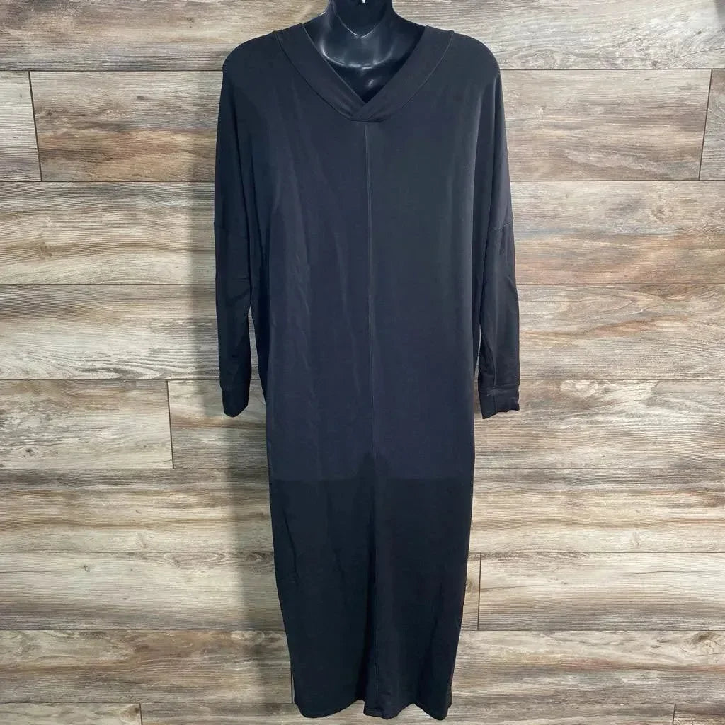 Front view of Quince black V-neck long-sleeve maxi dress size XS straight fit on mannequin with wood background