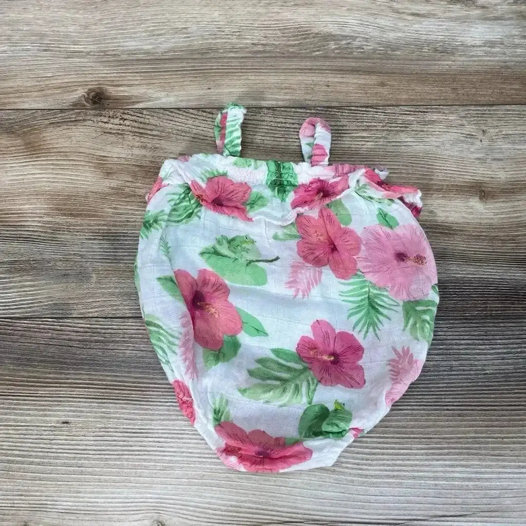 Flat lay of Angel Dear organic hibiscus bubble romper 0-3m showing pink floral print, ruffle trim and straps on wood