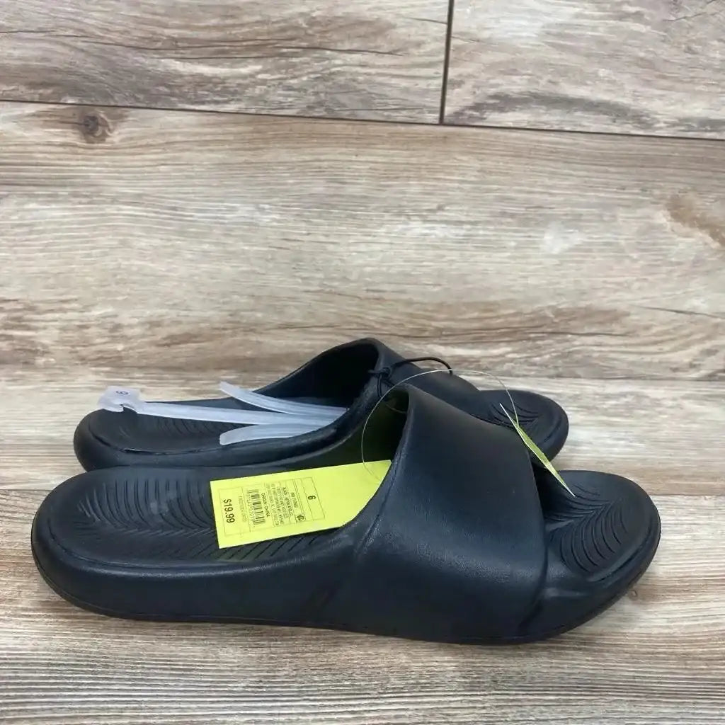 Three-quarter view of black All in Motion Apollo slip-on sandal (6Y) showing wide strap and textured sole on white