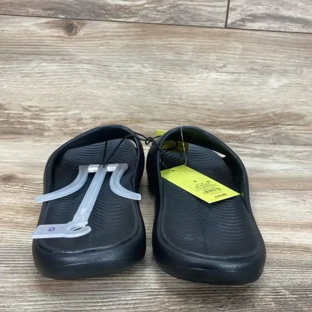 Three-quarter view of black All in Motion Apollo slip-on sandal (6Y) showing wide strap and textured sole on white