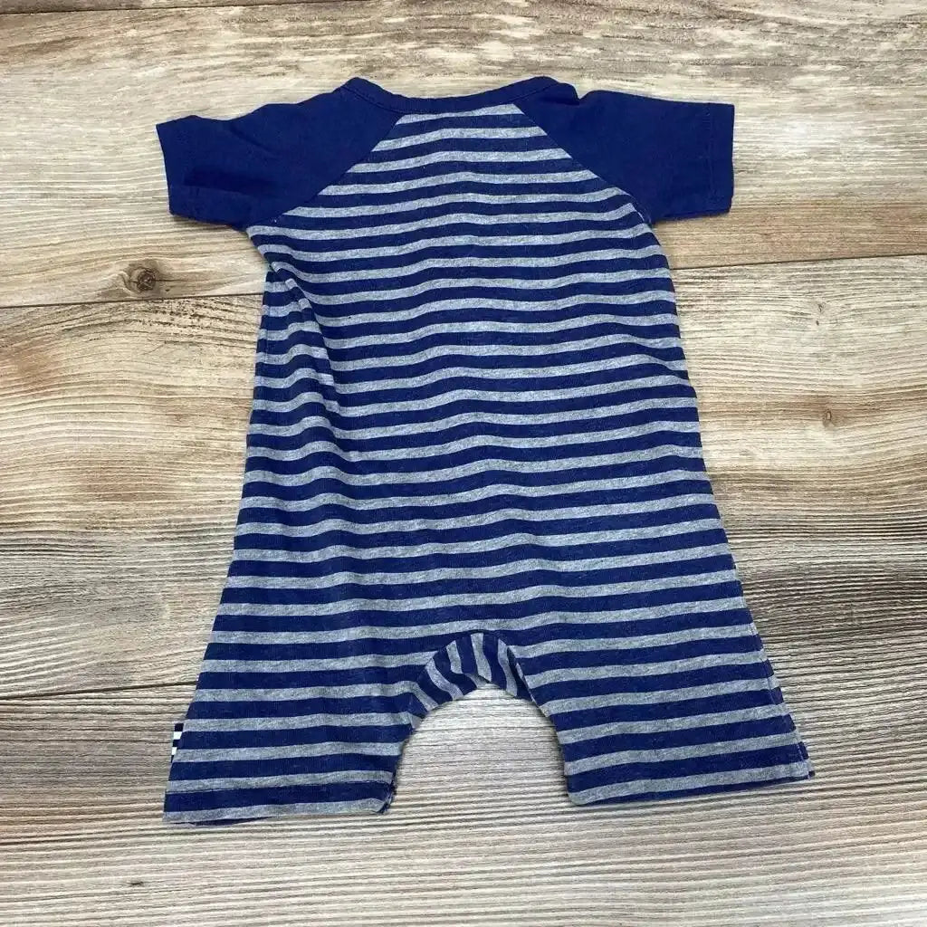 Flat lay of Splendid striped Henley baby romper (0-3 months) showing navy raglan sleeves and blue-gray stripes on wood floor