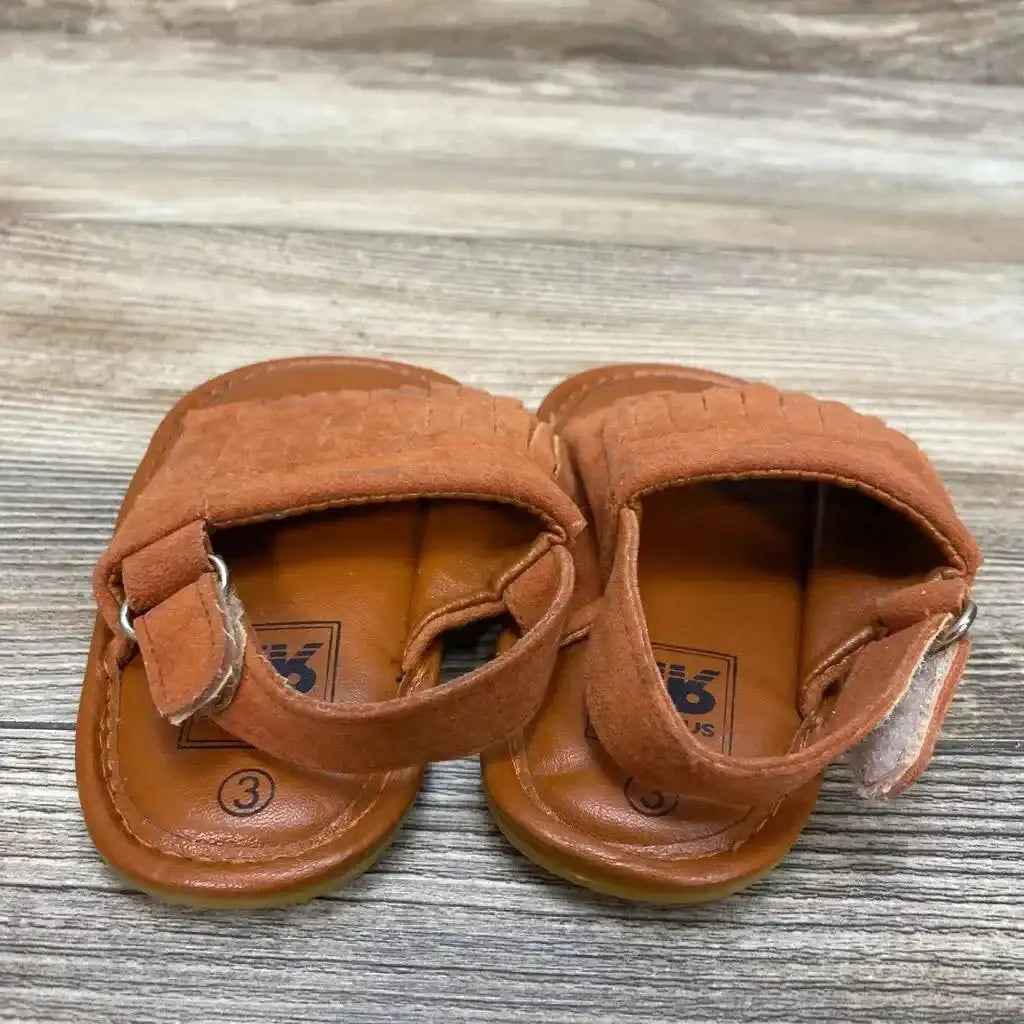 Front view of Romirus red toddler moccasins (size 3C) showing fringe trim and stitched toe on white background