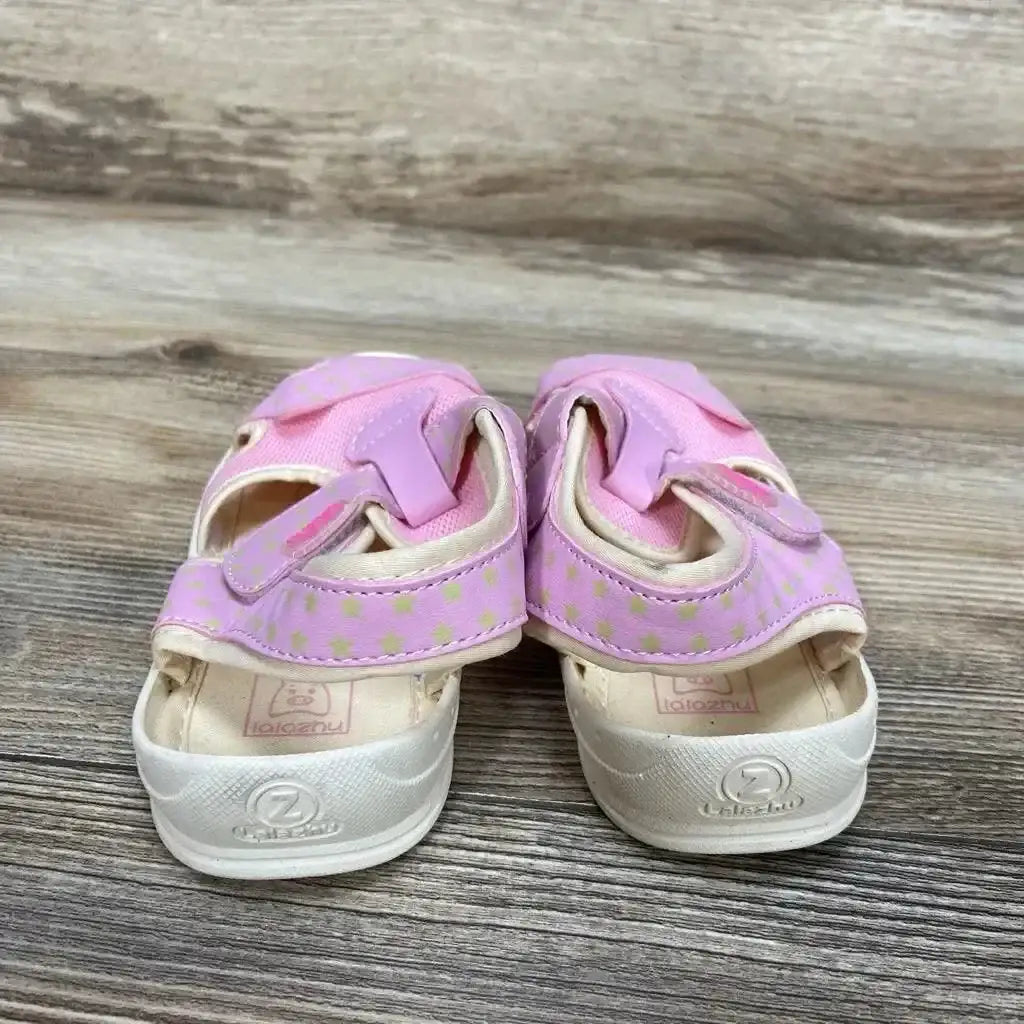 Back view of Lalazhu Soft Microfiber Leather Sandals size 8/9c showcasing pink star print straps and white soles on wood plank floor