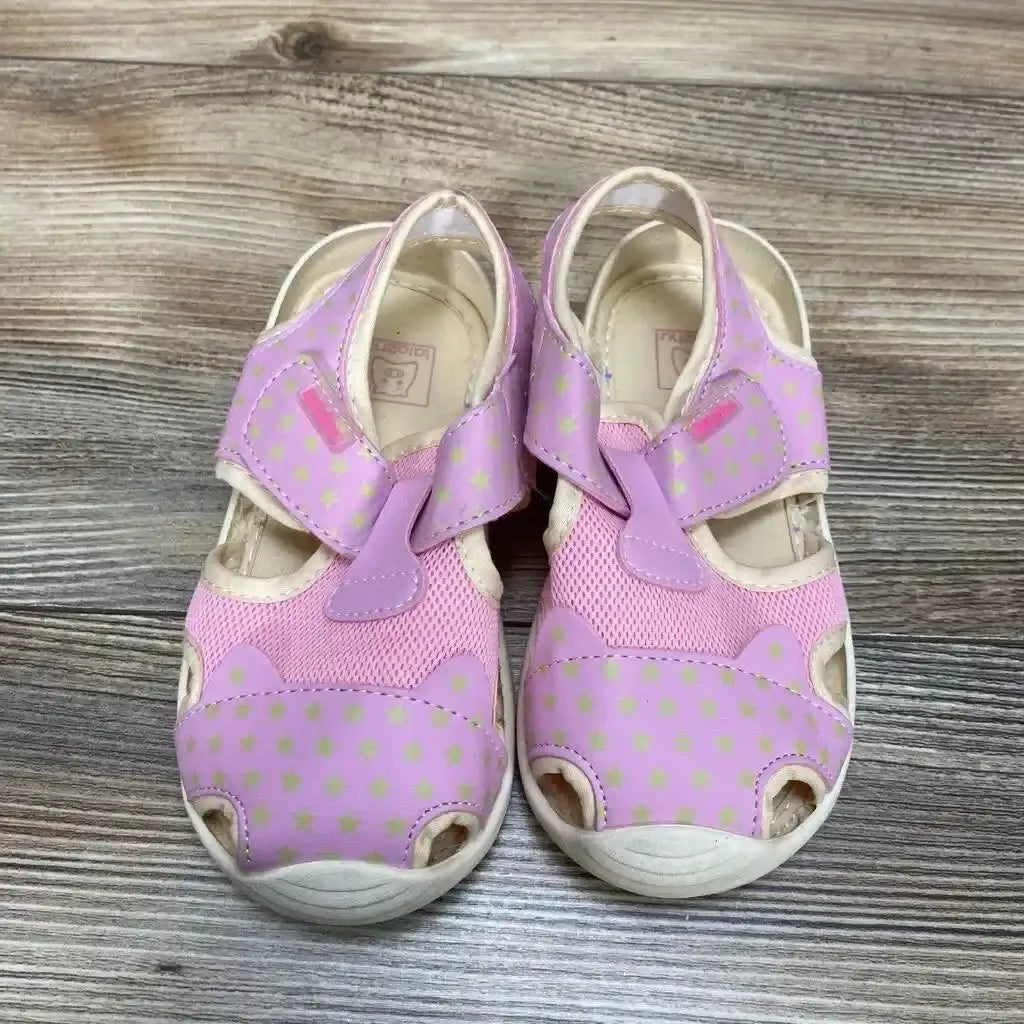 Top-down view of pink Lalazhu toddler sandals size 8/9C showing closed-toe mesh and microfiber upper with gold star print on wood floor