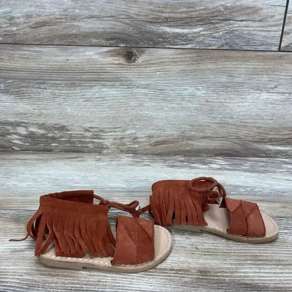 Front and side view of red Zara baby fringe sandals size 4C showcasing fringe detail and ankle strap on white background