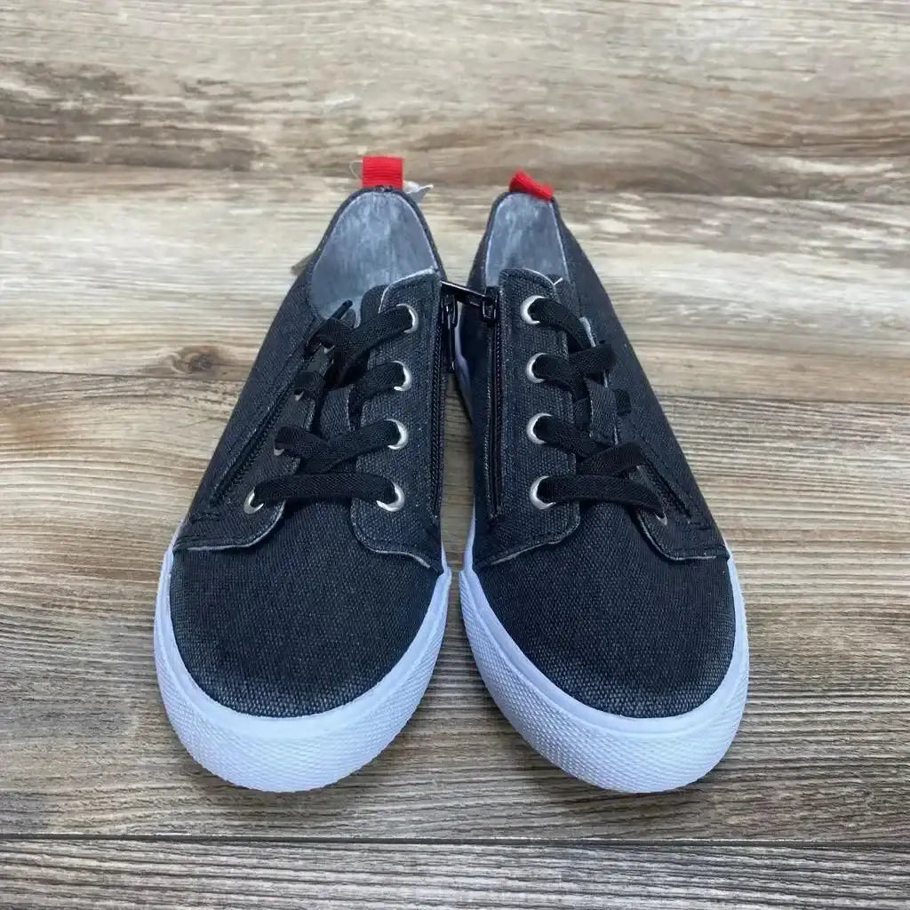 Front view of Cat & Jack Lucian grey double zipper sneakers showing side zippers, black laces and white soles on wood