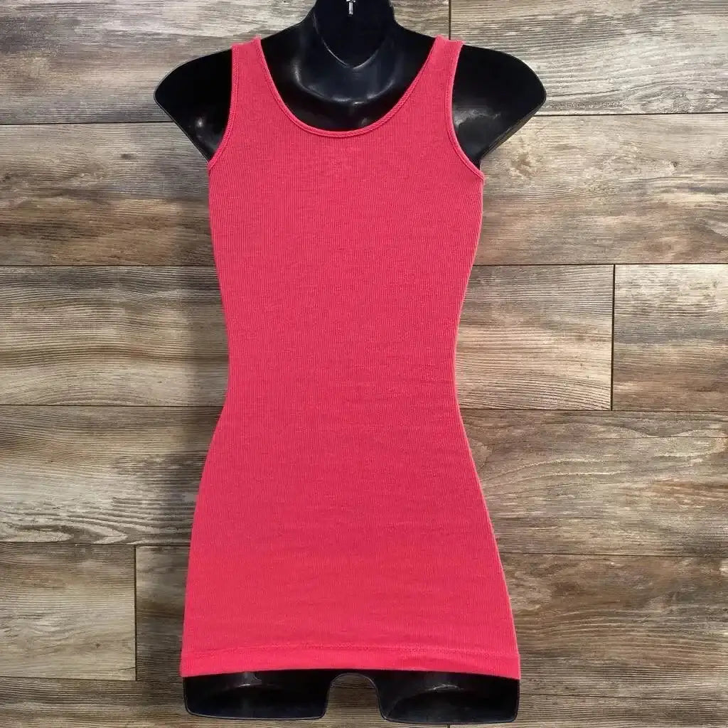 Front view of pink ribbed tank top XS showing fitted sleeveless silhouette on black mannequin against wood plank background