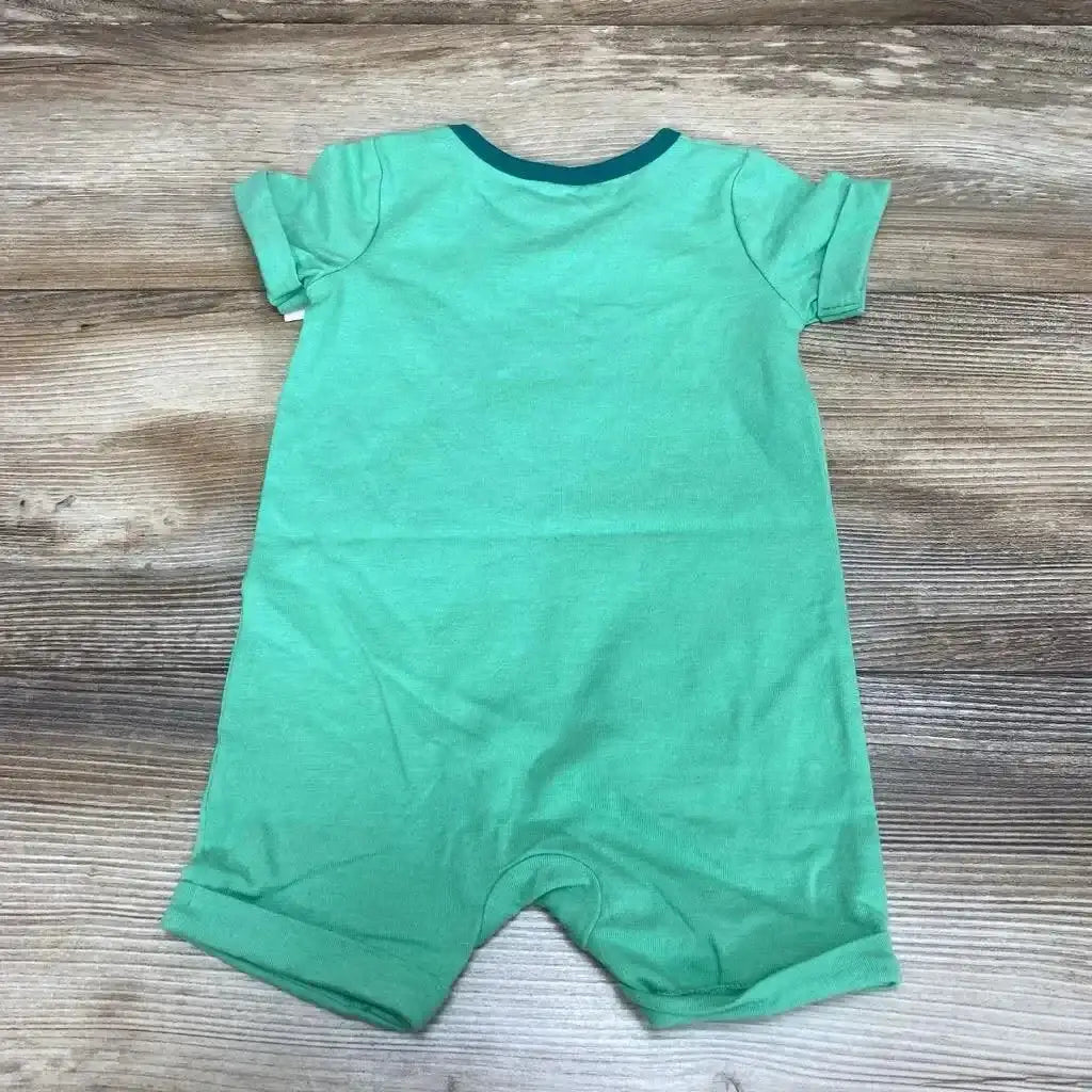 Flat lay back view of green Cat & Jack short sleeve romper with teal neck trim on wood background