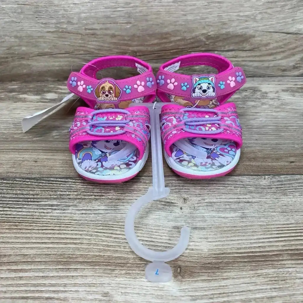 Front of pink Paw Patrol toddler ankle-strap sandals size 7C, character on front strap and adjustable ankle strap