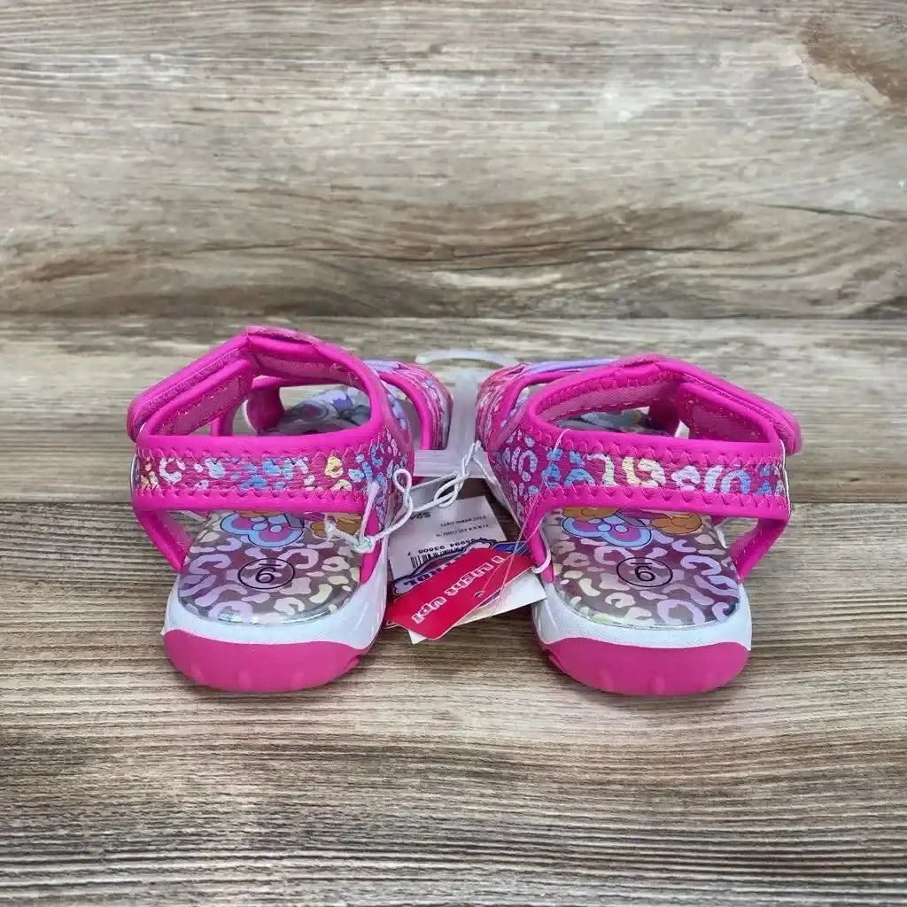 Front view of pink Paw Patrol ankle-strap toddler sandals size 9C with adjustable strap on white background