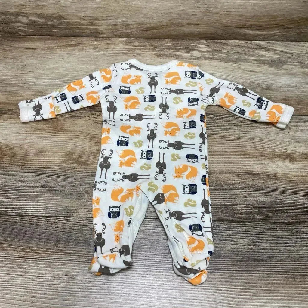 Flat lay front view of white preemie Hudson Baby footed sleeper showing orange fox, gray deer, and navy owl print with snap closures on wood background