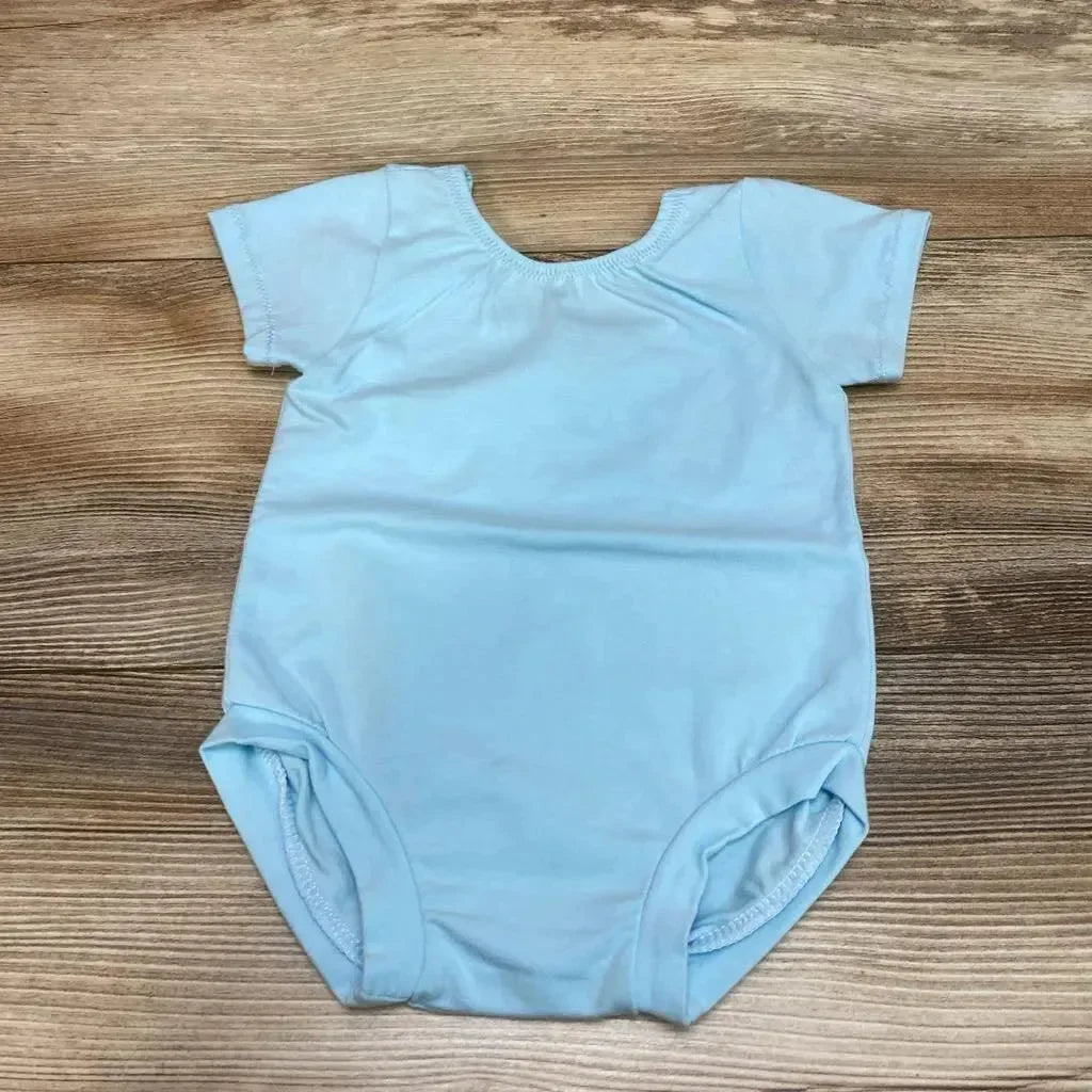 Flat lay of blue baby bodysuit 12m showing short sleeves, scoop neck and elastic leg openings on wood background used