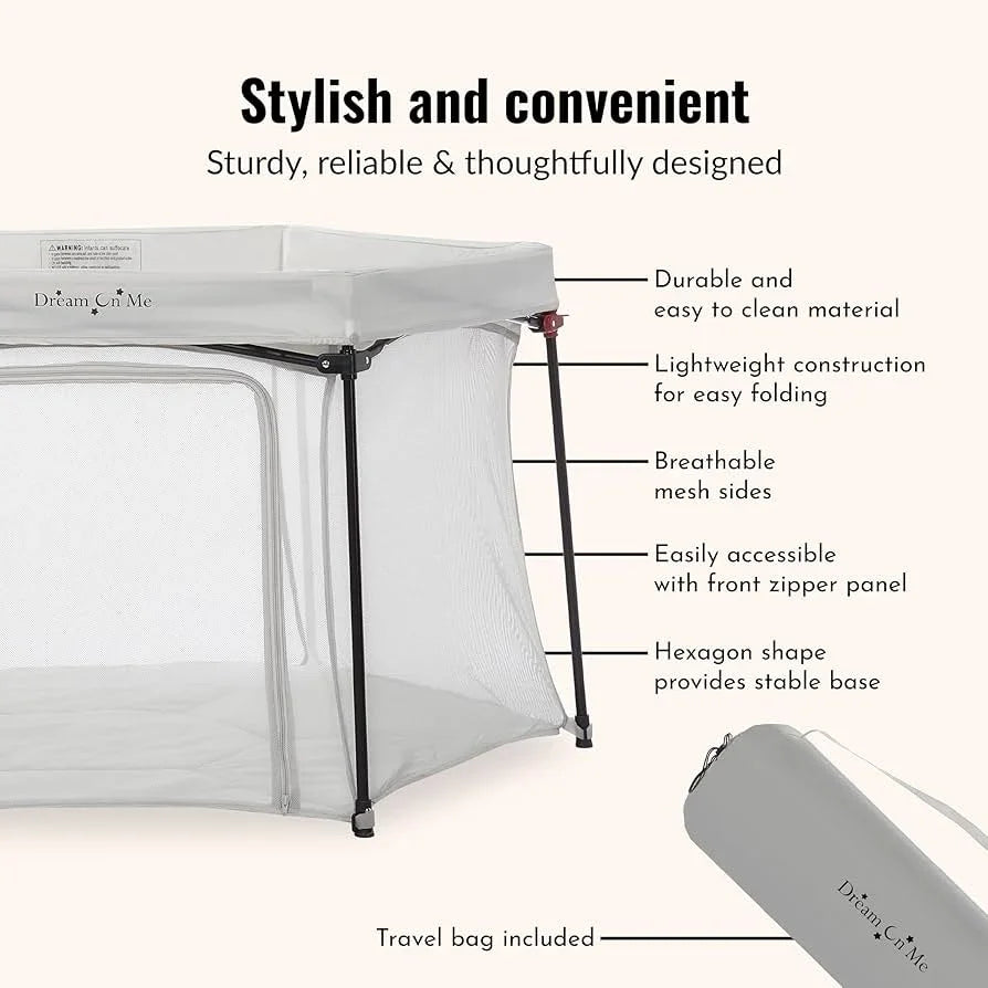 Dream On Me portable baby playard with mesh sides, hexagon base, front zipper, and travel bag