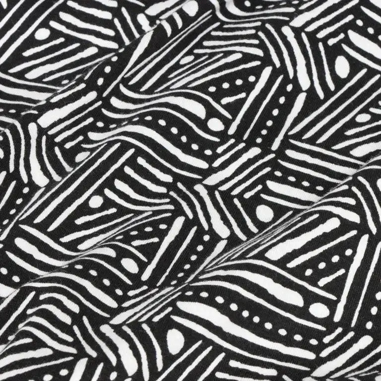 Close-up of Trend Lab Geometric Multi-Use Nursing Cover showcasing black and white abstract stripe and dot fabric print
