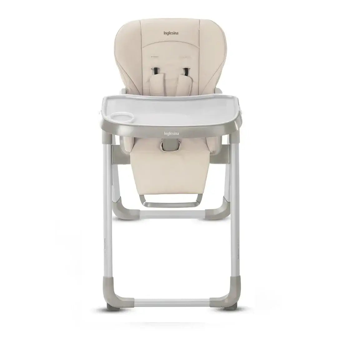 Beige Inglesina high chair with safety straps and tray for kids, ideal for mealtime and children's resale