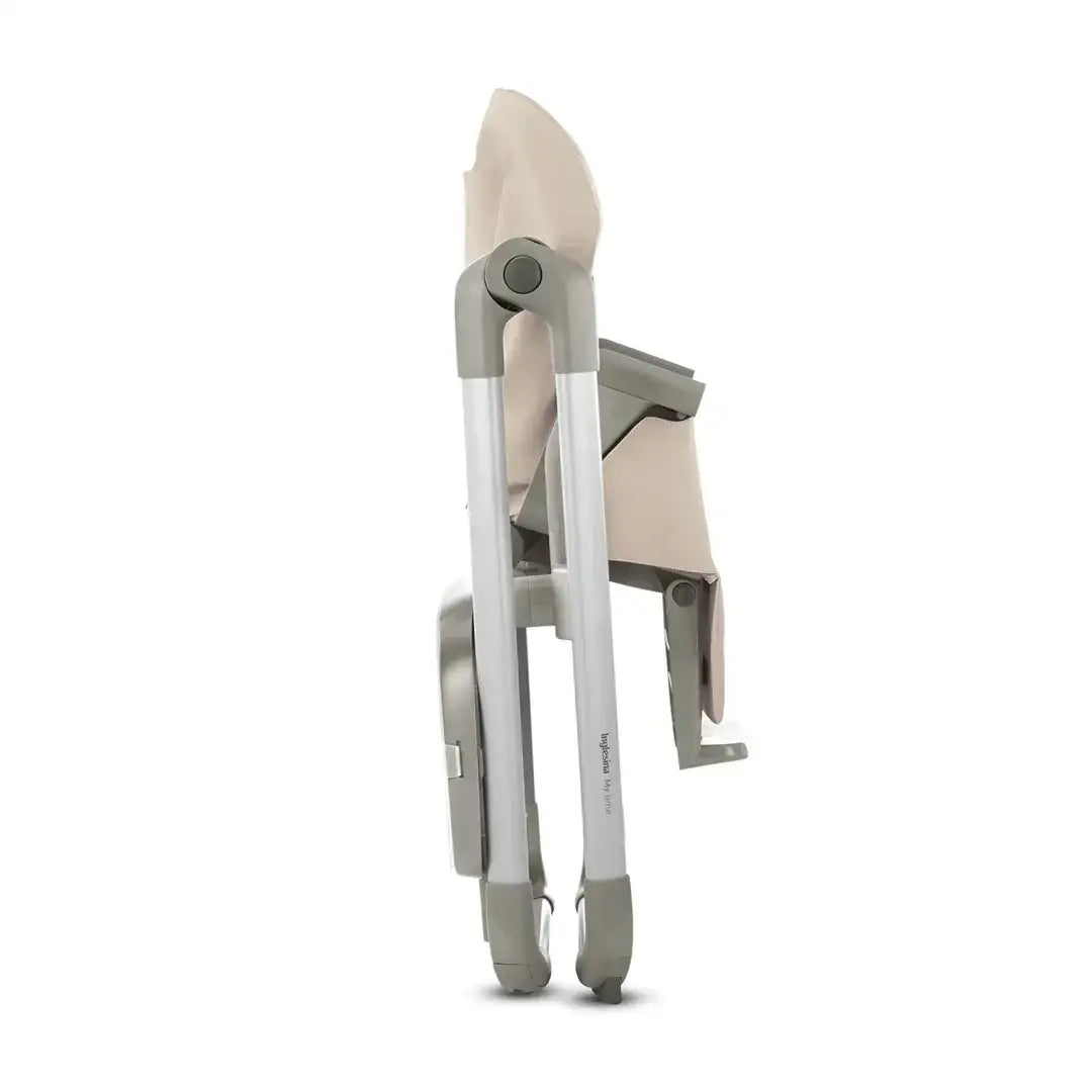Folded beige and gray Inglesina My Time portable high chair for babies and toddlers