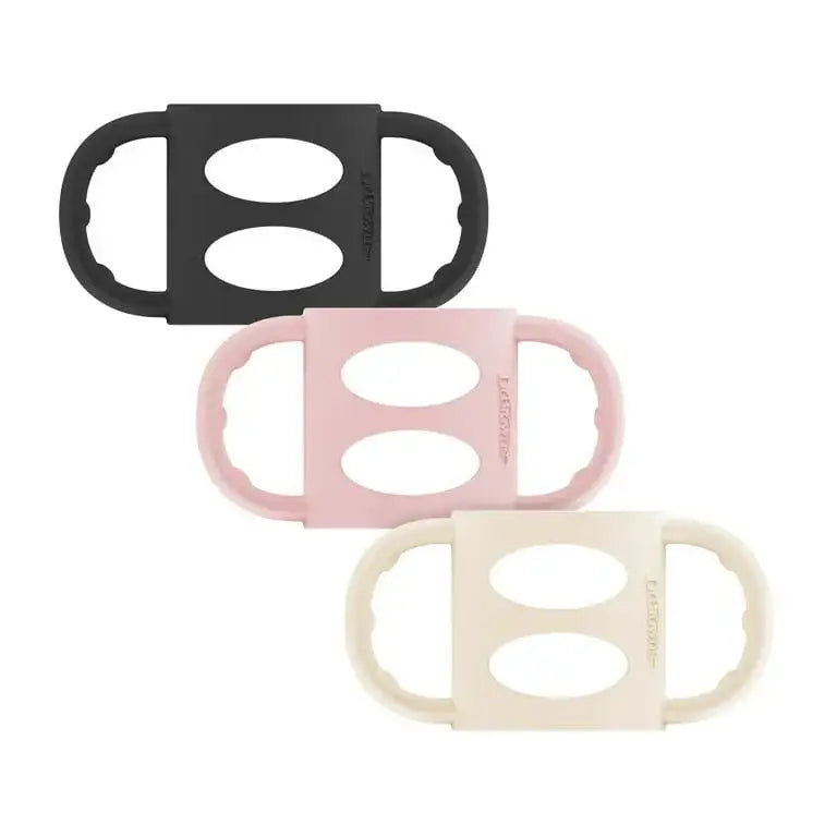 Front view of three Dr Brown’s Milestones narrow silicone bottle handles showcasing dual side grips on white