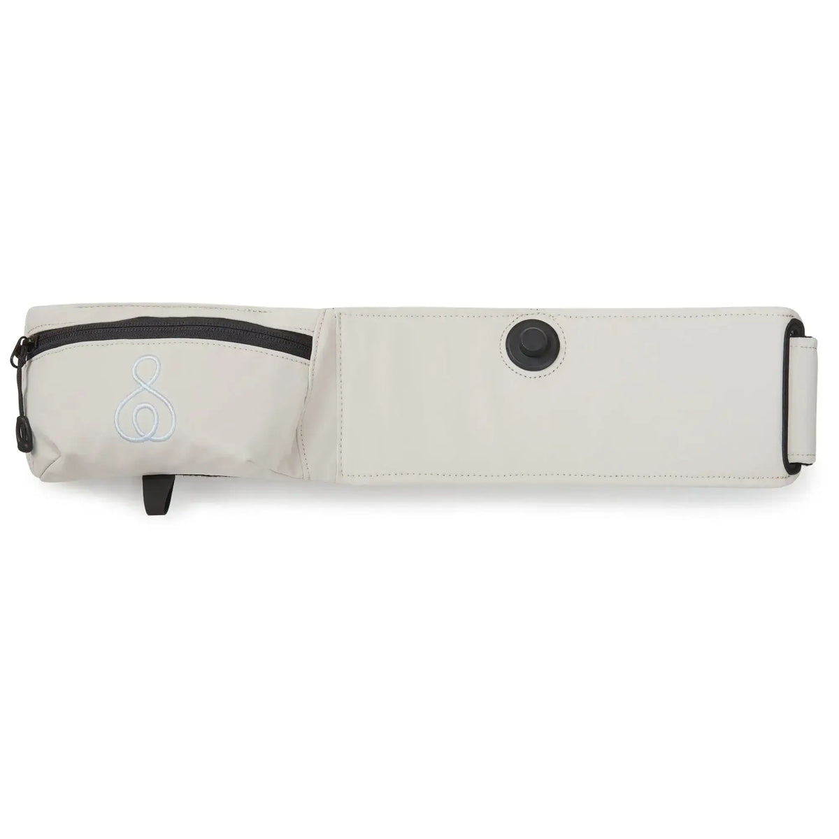 Flat lay of NEW Nessl Baby Carrier in oatmeal showcasing zip pocket and embroidered logo with white seamless backdrop