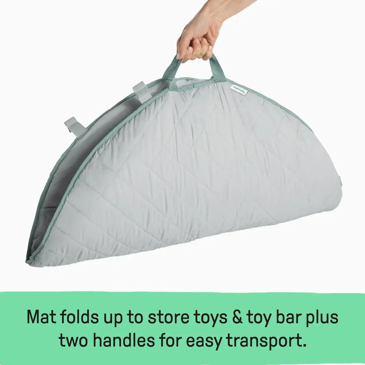 Infographic showing mat folds to store toys and toy bar, with two handles for easy transport