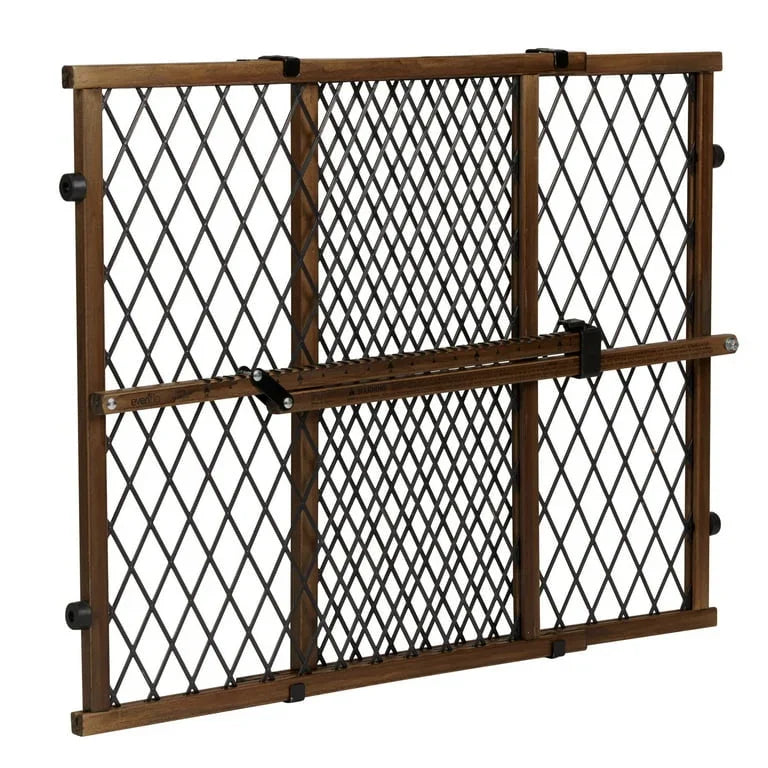 Front view of Evenflo doorway gate with farmhouse finish and center Position and Lock bar
